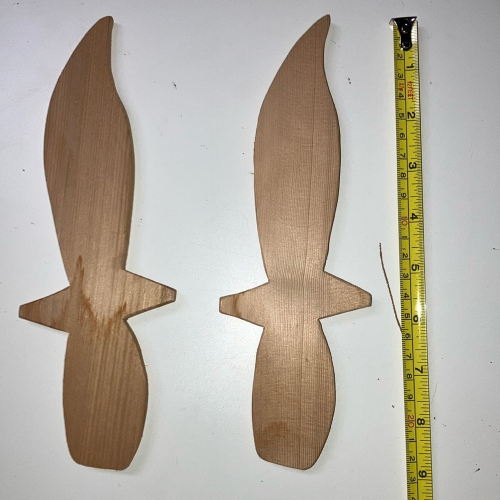 Two 9 x 3 wooden swords